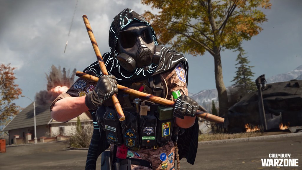 The Caine Operator (Trail Blazer skin) holding the Kali Sticks melee weapon inside of Call of Duty Warzone Verdansk.